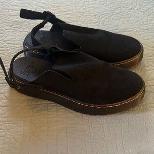 Dr. Martens black leather clogs